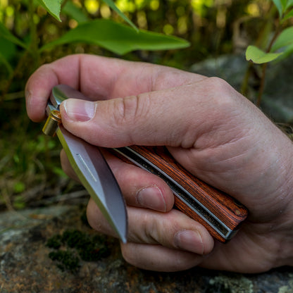 Opening aid for folding knives