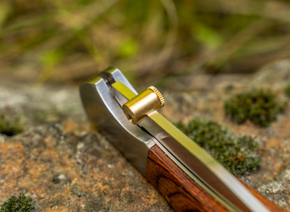 Opening aid for folding knives